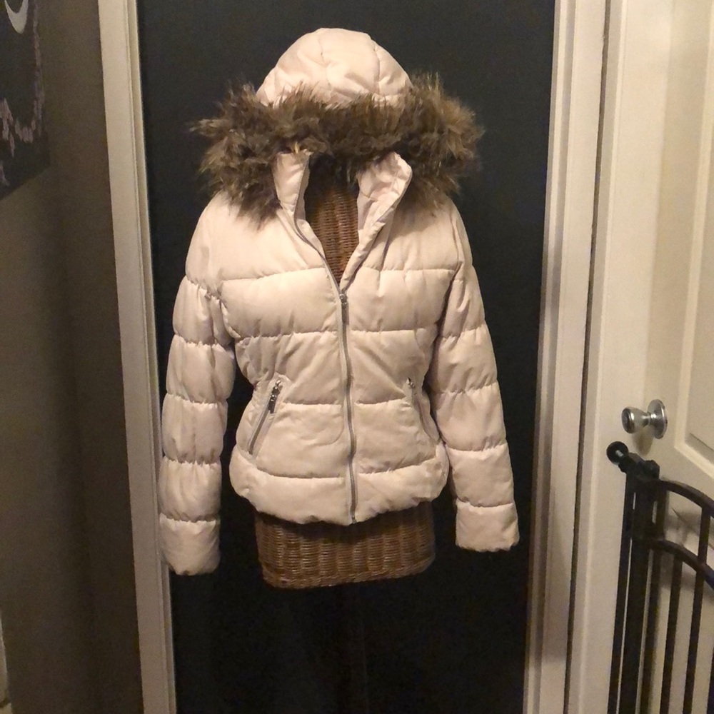 Warm puffy jacket with fur hood